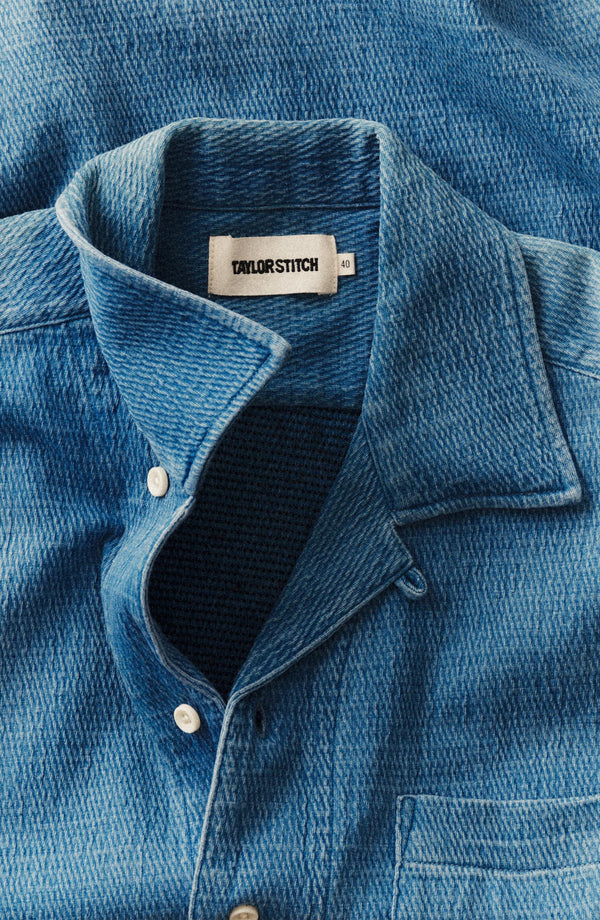 fit model showing off the buttons on The Hawthorne Shirt in Washed Indigo Crepe