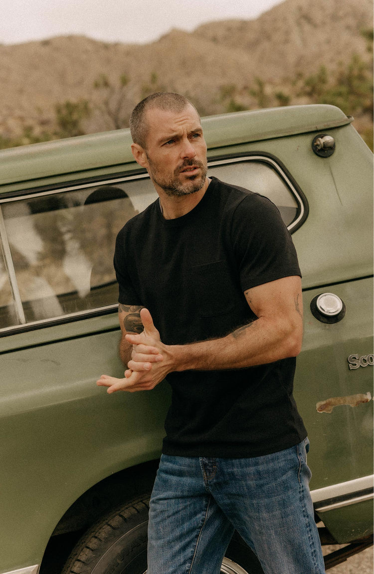 fit model walking in The Heavy Bag Tee in Black