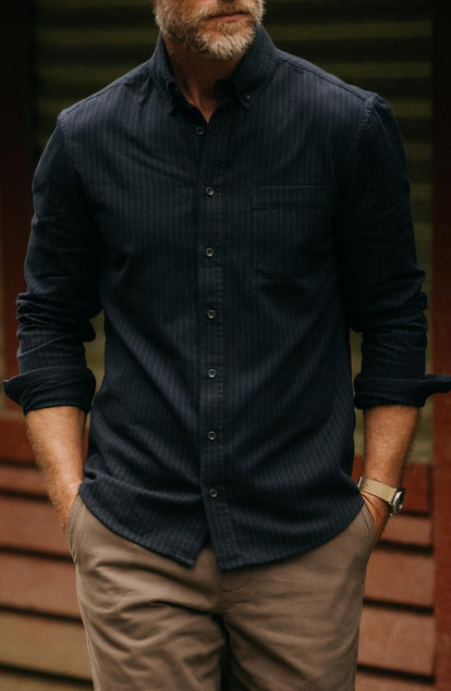 fit model with his hands in his pockets wearing The Jack in Brushed Heather Navy Stripe