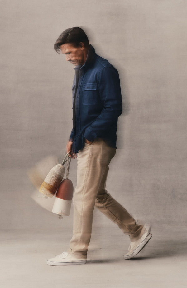 fit model walking wearing The Ledge Shirt in Atlantic Twill