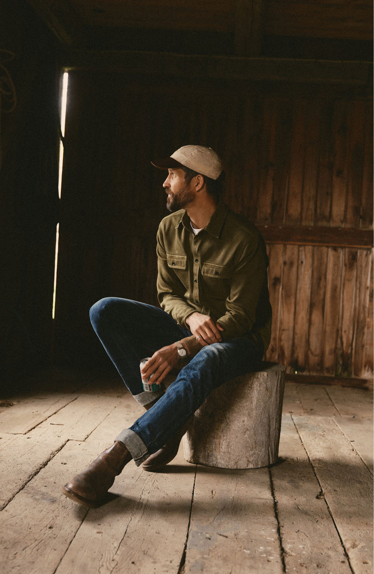 fit model posing in The Ledge Shirt in Bay Leaf Twill