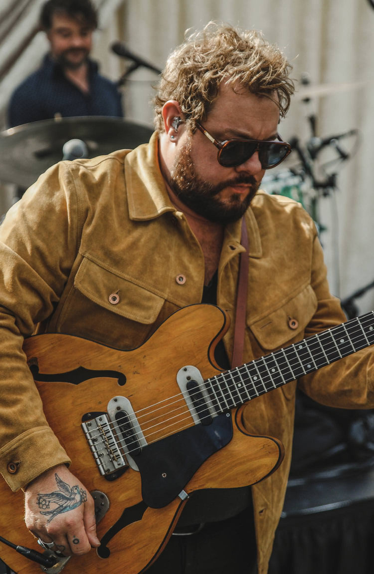 Nate Rateliff wearing The Lined Long Haul Jacket in Sand Suede