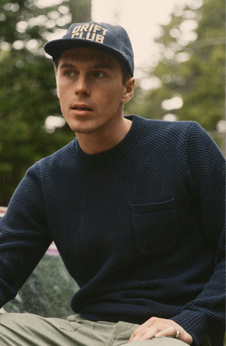 fit model posing in The Mercer Cap in Drift Club