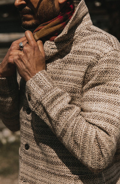 Close up of our model wearing The Ojai Jacket in Espresso Herringbone Wool with the collar popped