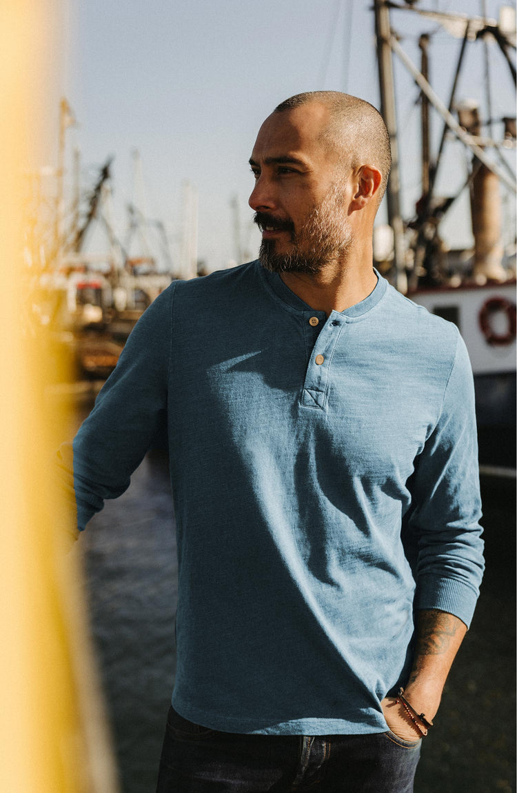 fit model posing in The Organic Cotton Henley in Washed Indigo