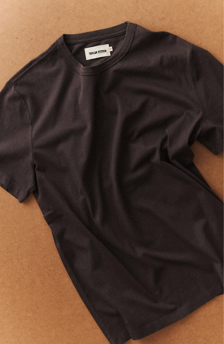 editorial flatlay of The Regenerative Cotton Tee in Soil