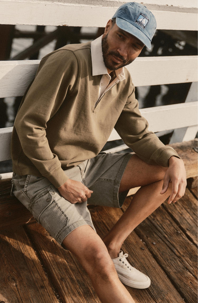 fit model posing in The Rugby Shirt in Burnt Olive