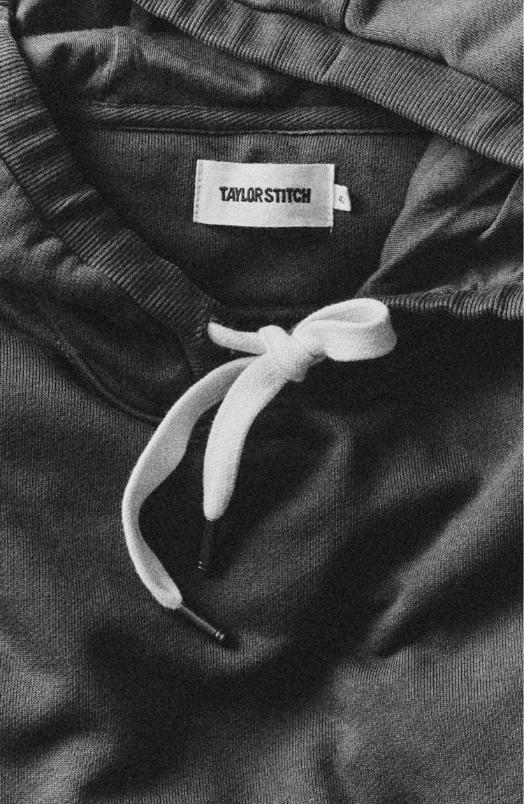 editorial flatlay of The Shop Hoodie in Ivy French Terry