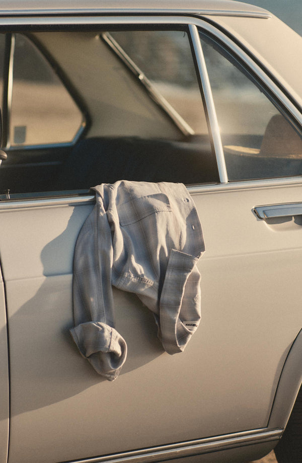 editorial image of The Shore Shirt in Fog Check Tencel on a car
