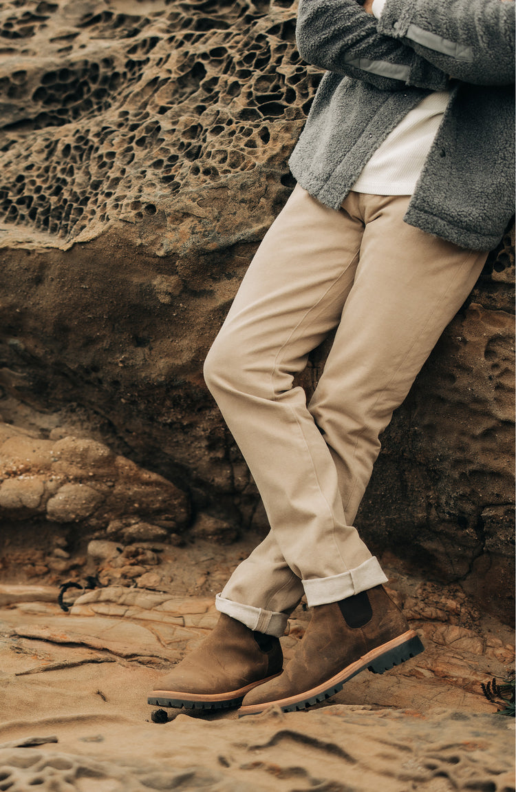 Our model wearing The Slim All Day Pant in Light Khaki Broken Twill