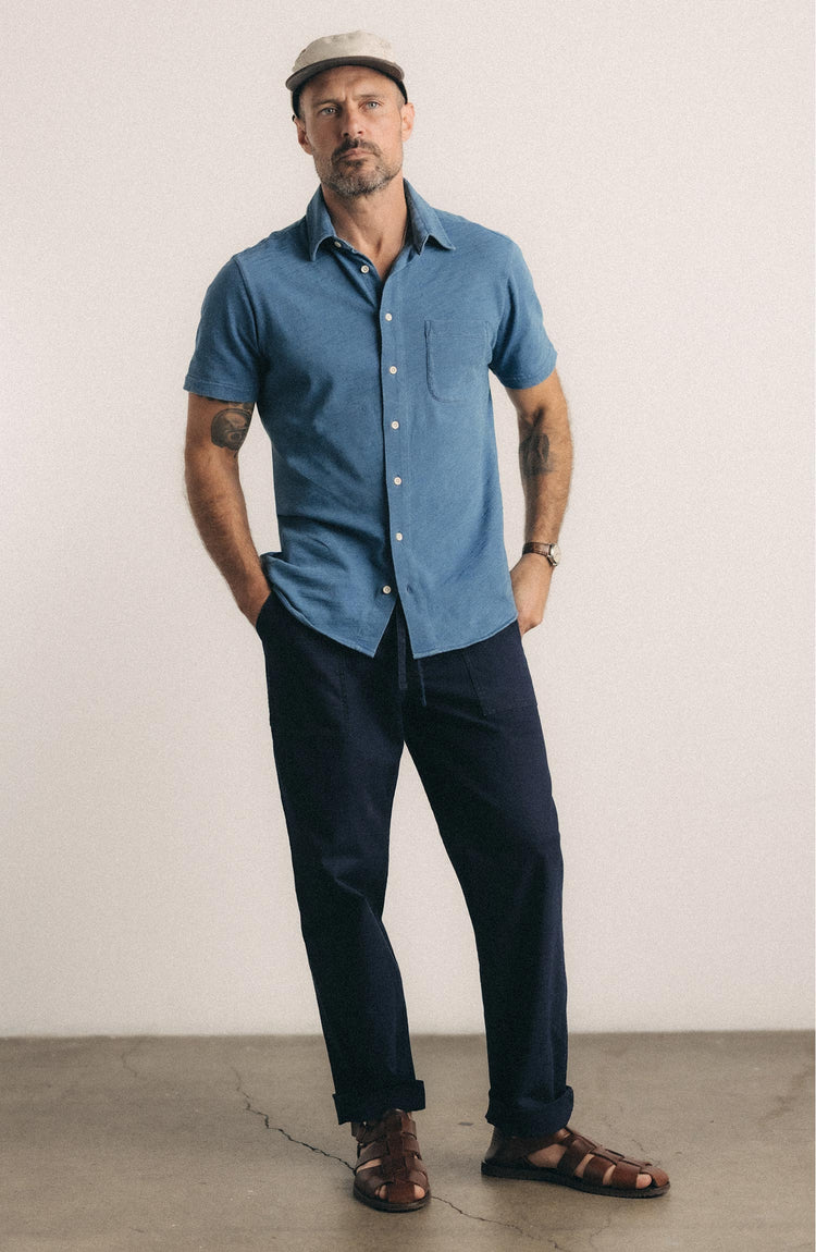 fit model posing in The Short Sleeve California in Washed Indigo Slub