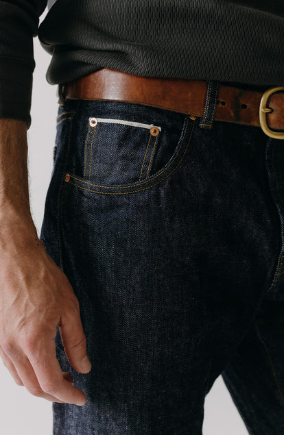 fit model showing off the cuffs on The Straight Jean in Rigid Organic Selvedge