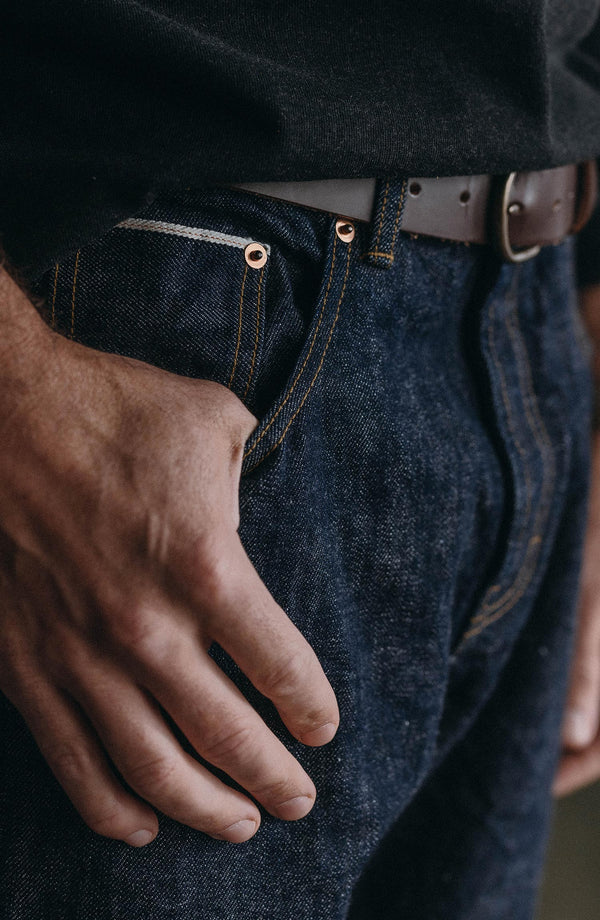 fit model showing off the cuffs on The Straight Jean in Rigid Organic Selvedge