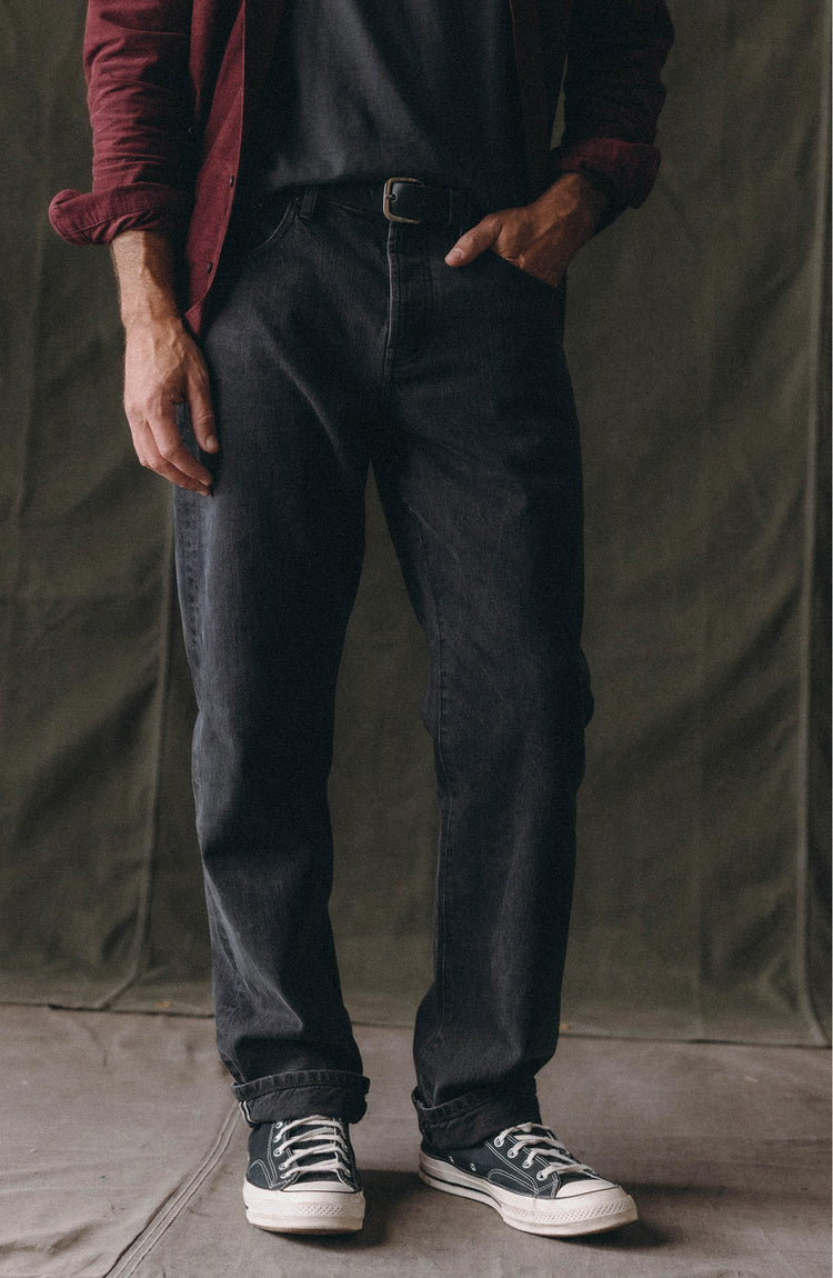 fit model posing in The Straight Jean in Washed Black Organic Slub Selvedge