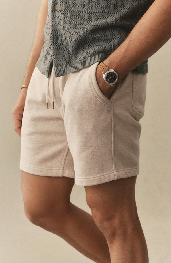 fit model with his hand in the pocket of The Sunset Short in Heather Oat Terry
