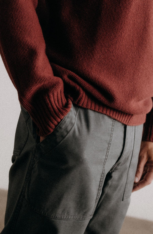fit model showing off the pocket on The Surplus Pant in Faded Black Reverse Sateen