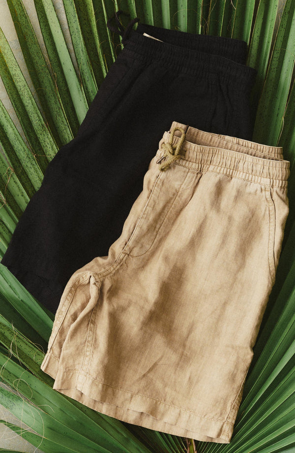 editorial flatlay of The Apres Short in Coal Hemp