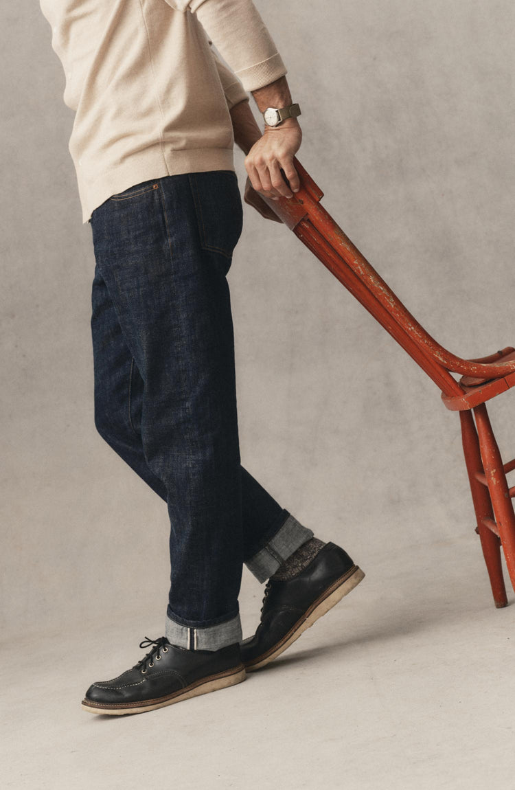 fit model posing in The Democratic Jean in Rinsed Organic Selvedge