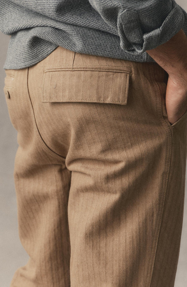 fit model showing off the back of The Emlen Pant in Khaki Herringbone