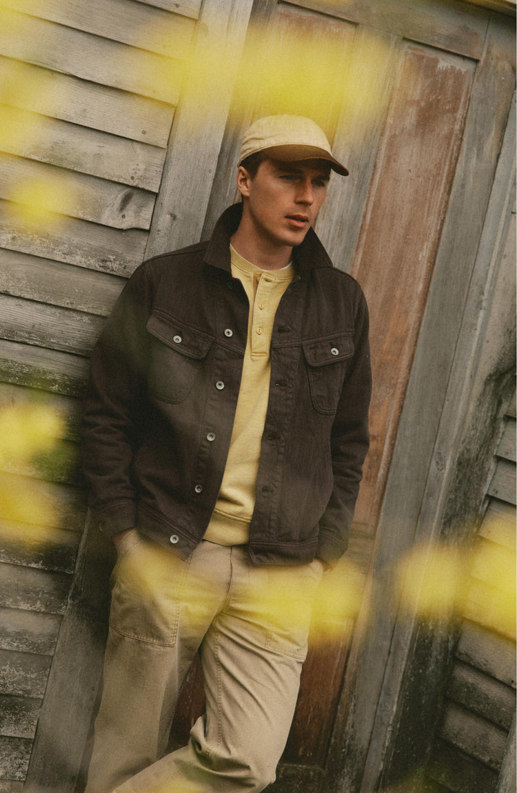 fit model posing in The Long Haul Jacket in Mid Wash Organic Selvedge