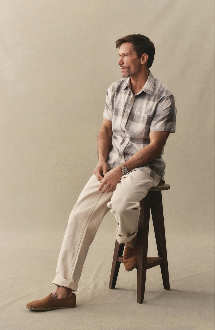 fit model posing in The Short Sleeve California in Overcast Check Hemp