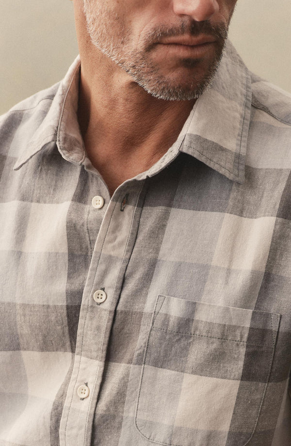 fit model showin goff the collar on The Short Sleeve California in Overcast Check Hemp