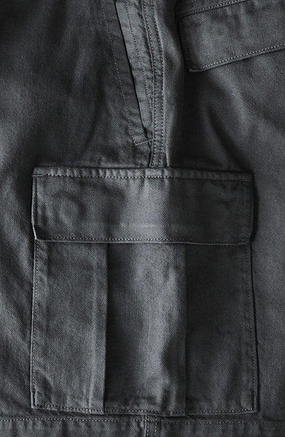 material shot of the pocket on The Tommie Short in Faded Black Broken Twill