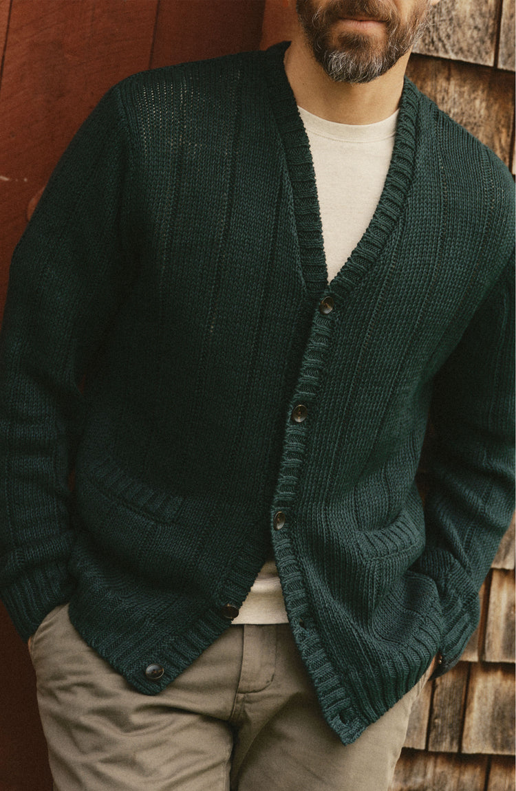 fit model posing in The Trench Cardigan in Dark Forest Rib Linen