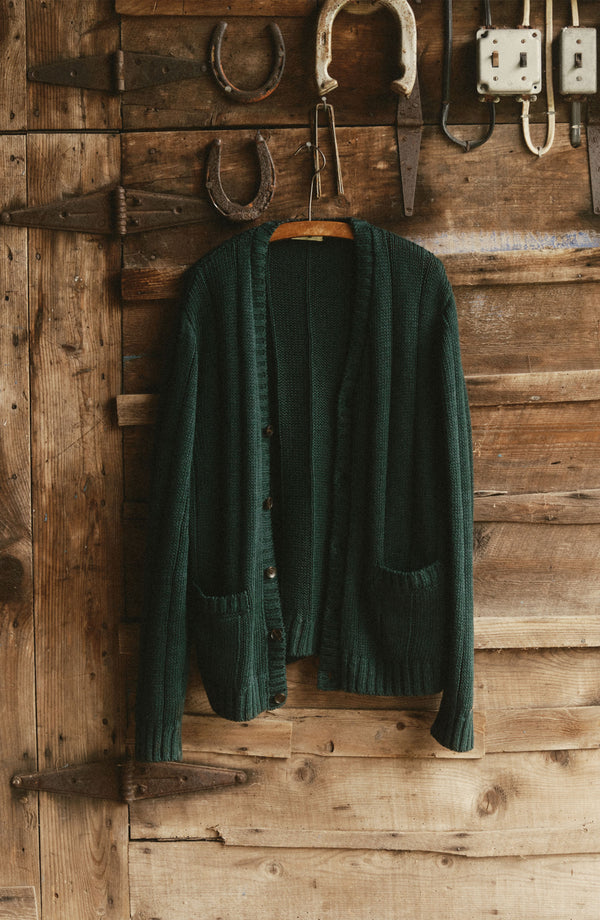 editorial image of The Trench Cardigan in Dark Forest Rib Linen hanging