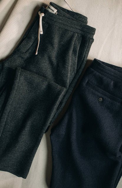 Both colorways of The Weekend Pant in Charcoal Herringbone Wool laying next to each other