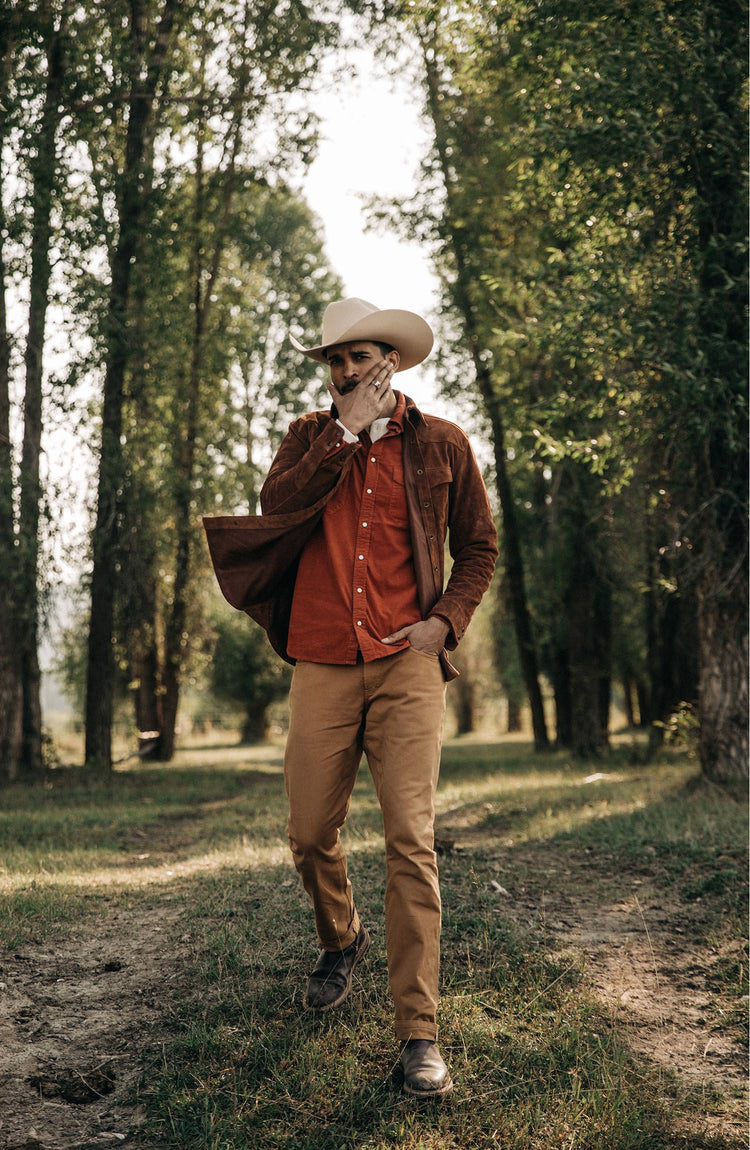 Our model wearing the shirt under a suede western jacket and a cowboy hat