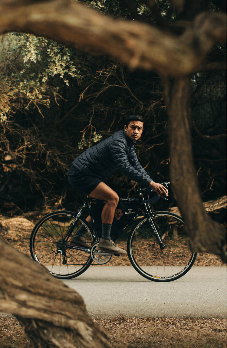 our model wearing the jacket with his bike