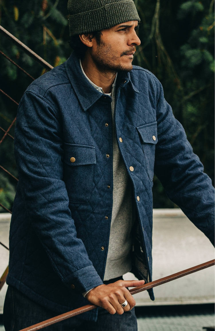 our guy rocking the quilted jacket—cropped shot looking right