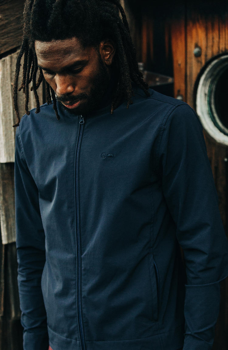 Our guy rocking The Tracksmith Collection bomber, split shot, prepping for trail run