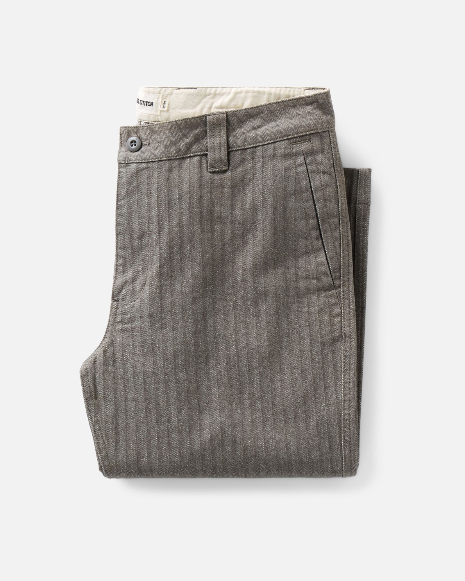 folded flatlay of The Emlen Pant in Smoked Olive Herringbone, Bottoms by Taylor Stitch