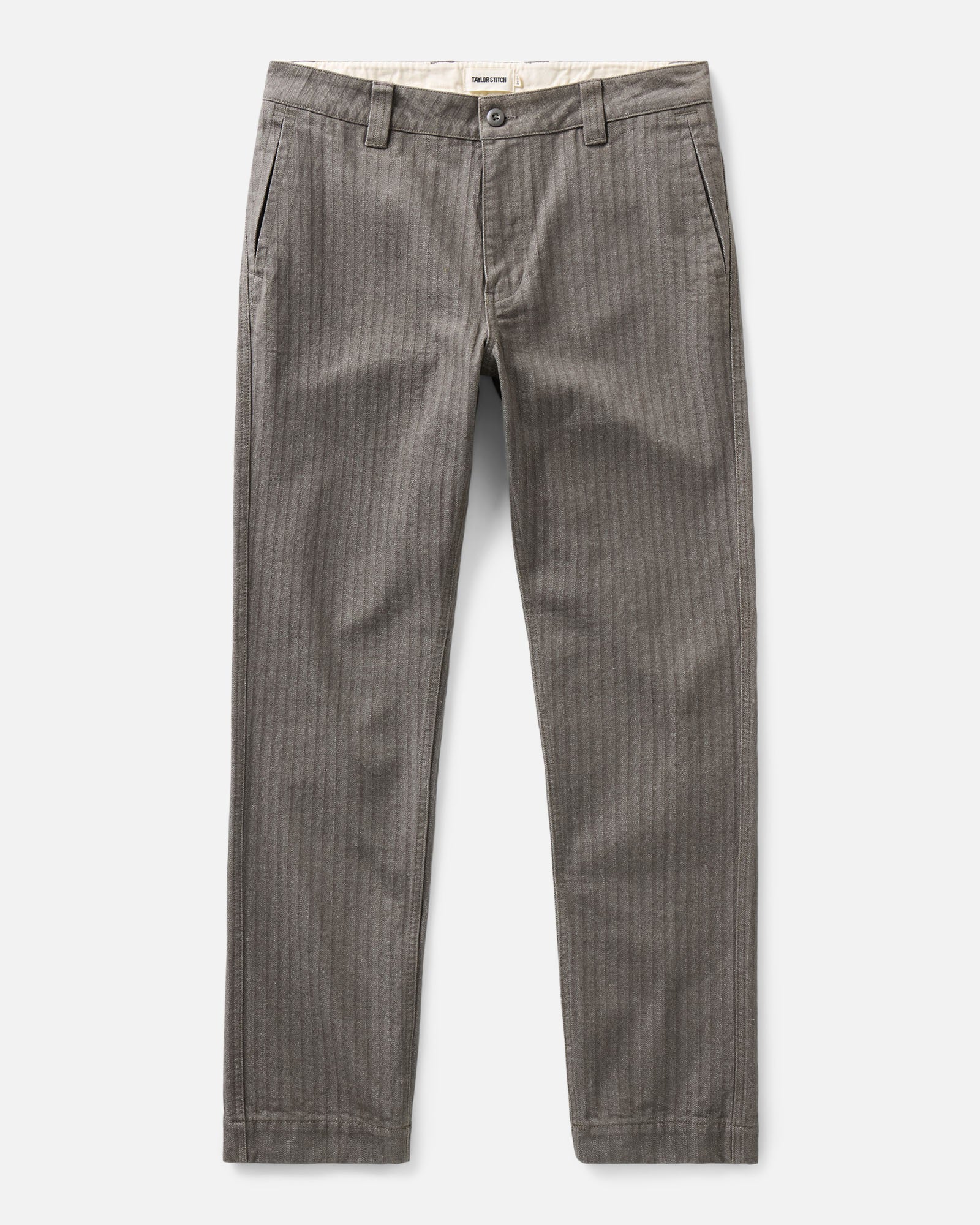 flatlay of The Emlen Pant in Smoked Olive Herringbone, Bottoms by Taylor Stitch