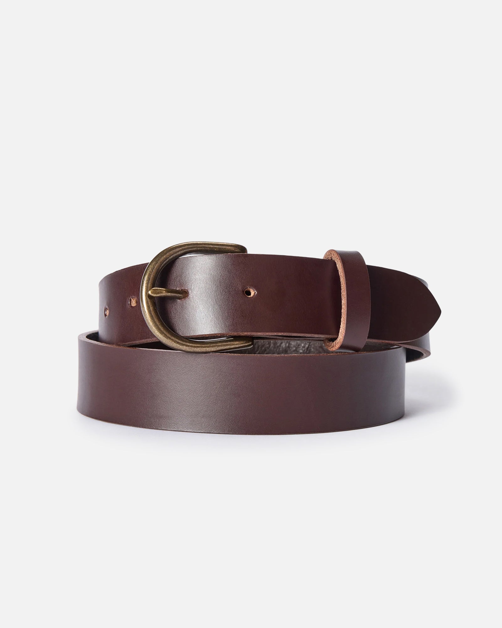 editorial image of The Foundation Belt in Dark Brown wrapped up, Accessories by Taylor Stitch