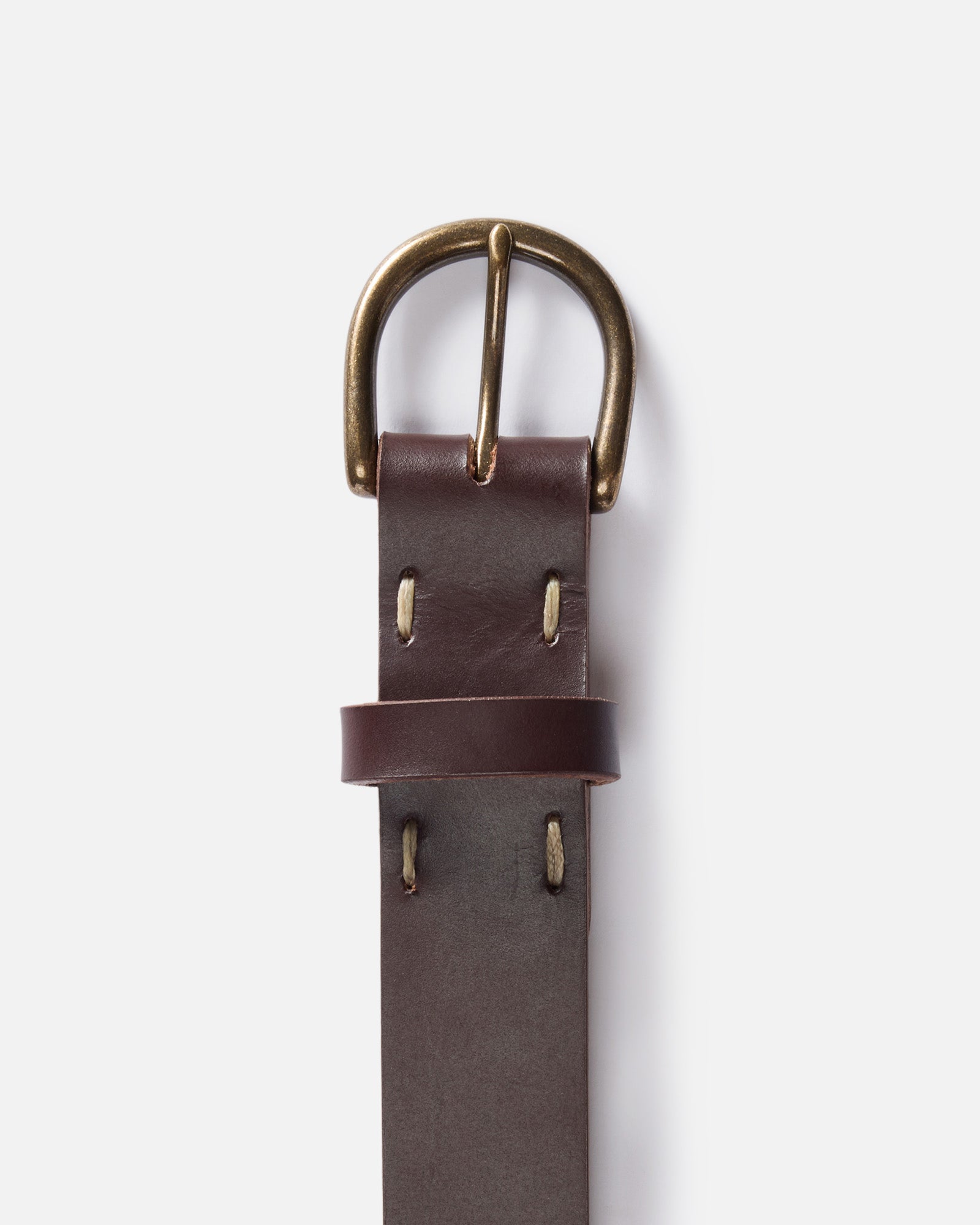 editorial flatlay of the buckle on The Foundation Belt in Dark Brown, Accessories by Taylor Stitch
