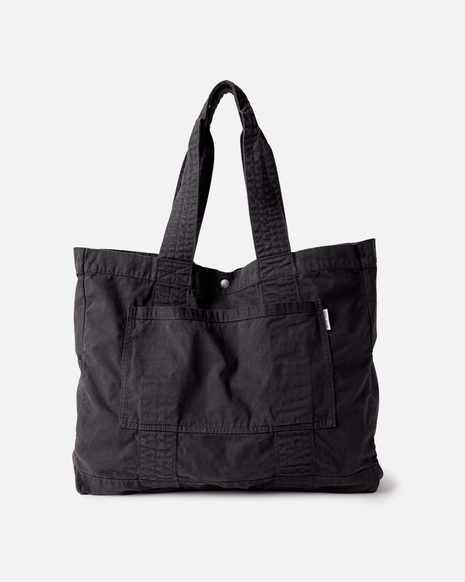 front image of The Foundation Tote in Organic Faded Black, Accessories by Taylor Stitch