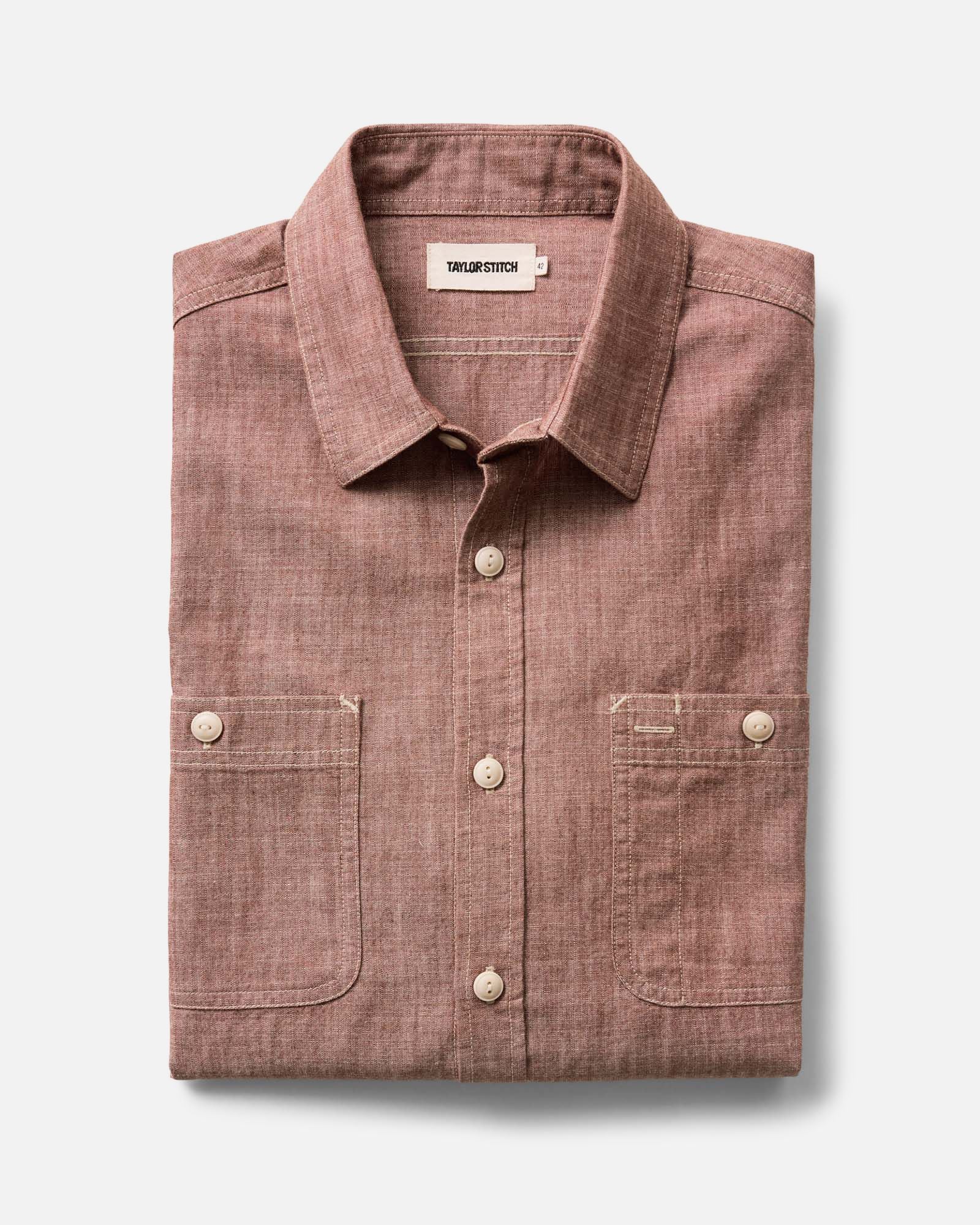 folded flatlay of The Foundry Shirt in Brick Chambray, Wovens by Taylor Stitch