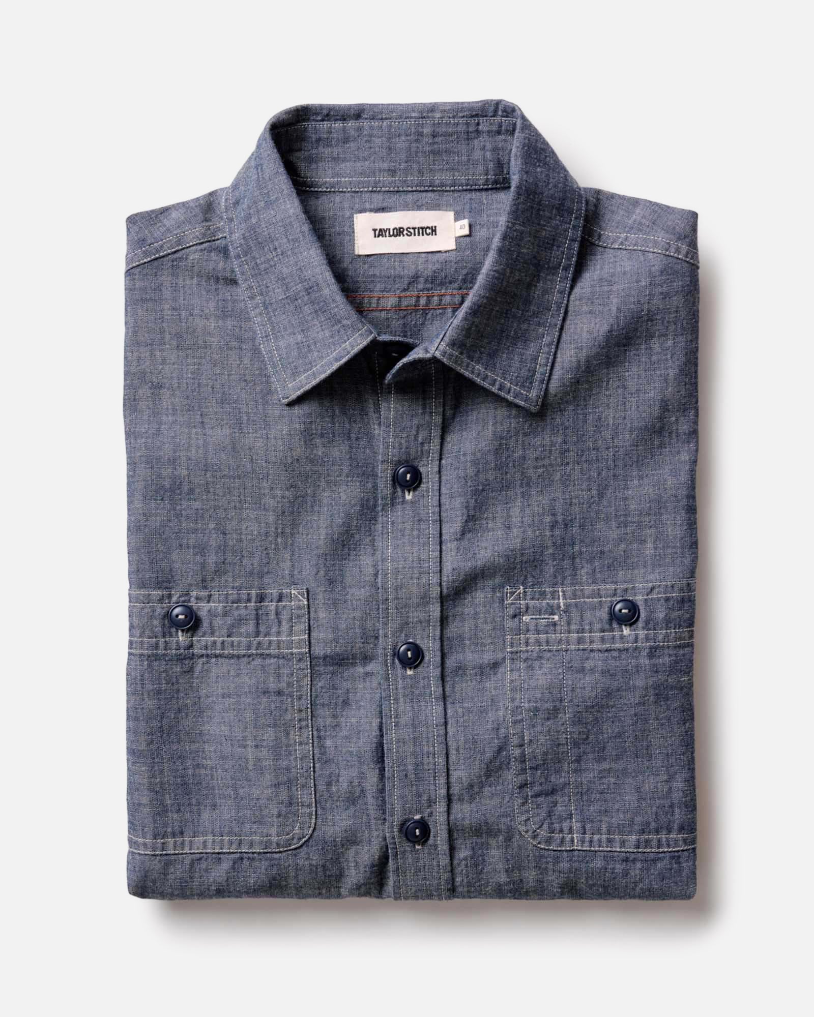 folded flatlay of The Foundry Shirt in Rinsed Indigo Chambray, Wovens by Taylor Stitch
