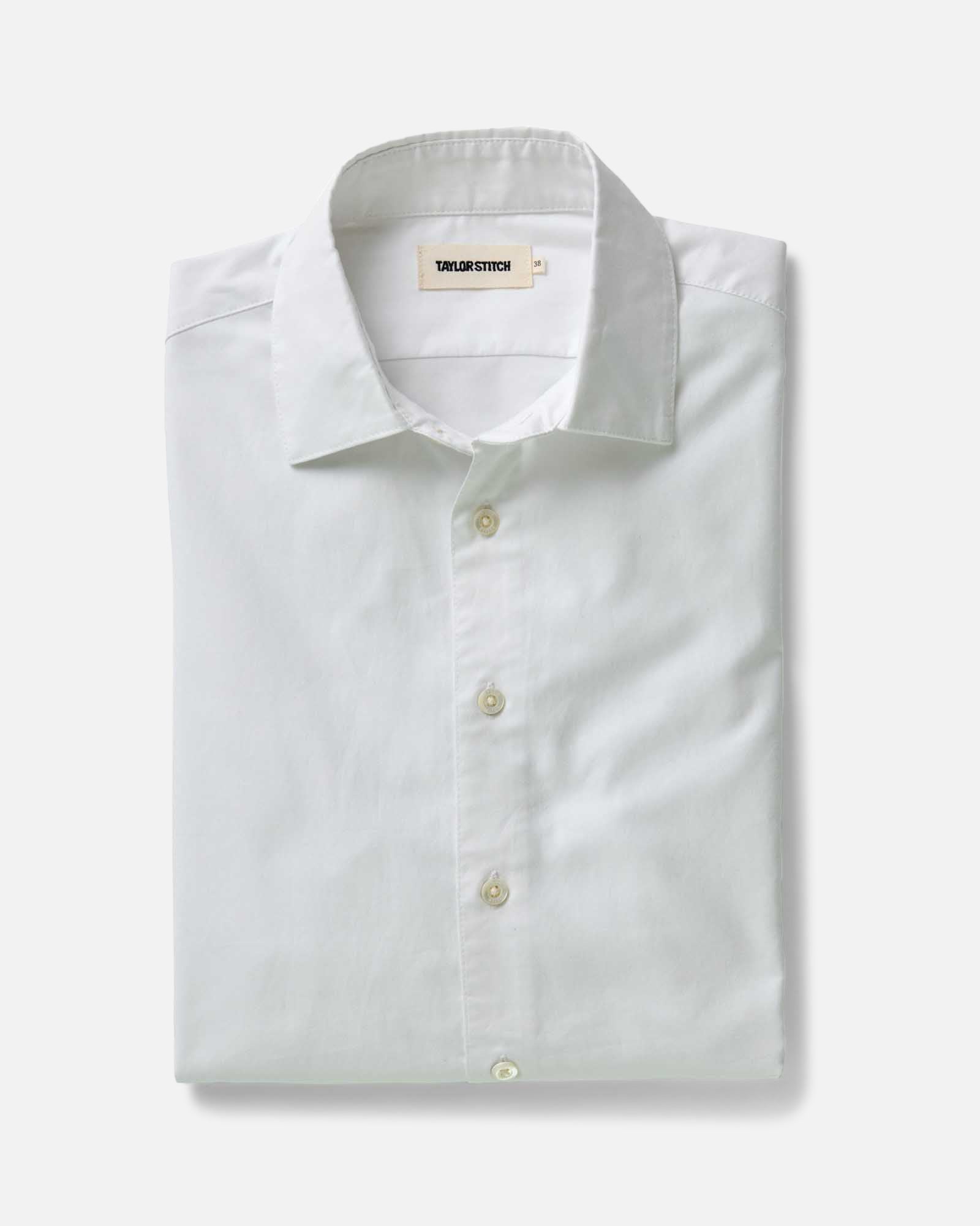 folded flatlay of The Hyde Shirt in White Pinpoint Oxford, Wovens by Taylor Stitch