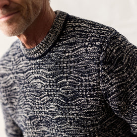 fit model showing the knit detail of The Chatham Crew in Marine Stripe Jacquard