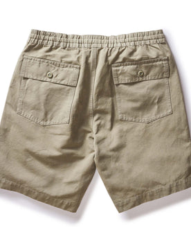 flatlay of the back of The Apres Trail Short in Light Sage Slub, Bottoms by Taylor Stitch