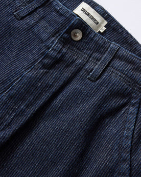 material shot of the button fly on The Morse Pant in Rinsed Indigo Stripe, Bottoms by Taylor Stitch