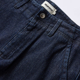 material shot of the button fly on The Morse Pant in Rinsed Indigo Stripe