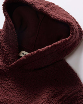 material shot of the hood on The Nomad Hoodie in Burgundy Sherpa, Outerwear by Taylor Stitch