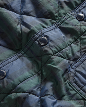 material shot of the snap buttons on The Ojai Jacket in Blackwatch Plaid Diamond Quilt, Outerwear by Taylor Stitch