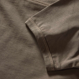 material shot of the ribbed sleeves on The Rugby Tee in Smoked Olive
