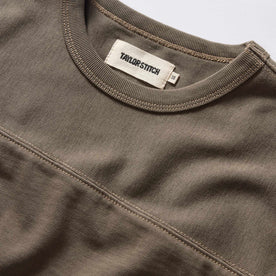 material shot of the neck opening and front yoke of The Rugby Tee in Smoked Olive